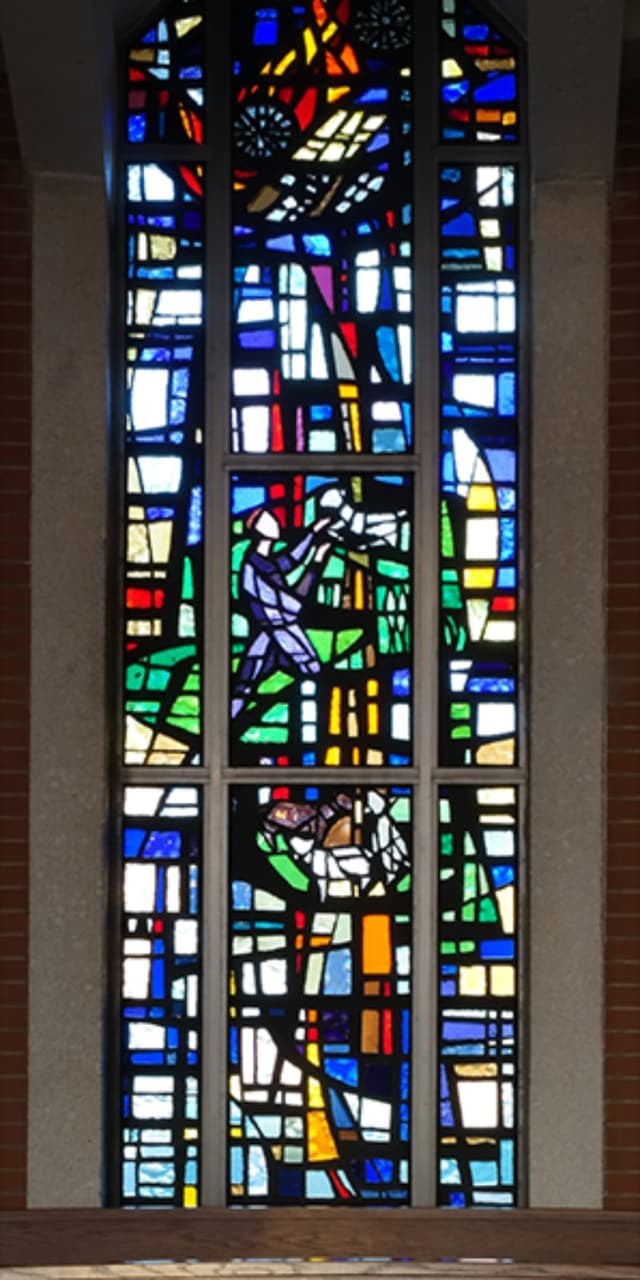 Chapel stained-glass window depicting the sower